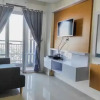 Отель Homey and Comfy 2BR at Vida View Apartment, фото 12