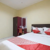 Отель OYO 1075 Rumah Indah Losari Inn, фото 7