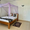 Отель Impeccable 3-bed Apartment in Mombasa, фото 2
