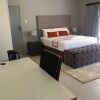 Отель The New Mall Guest House в Мауне