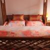 Отель Yinju Dali Qiumuju Inn, фото 6