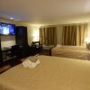Отель The Lion Inn & Suites, фото 2