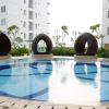 Отель Strategic 1Br At Bassura City Apartment, фото 1