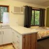 Отель Lake Eacham Tourist Park & Self Contained Cabins, фото 33