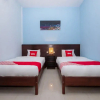 Отель Hening Homestay by OYO Rooms, фото 7