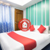 Отель OYO 128 d'Builders Rooms Phase 2, фото 14