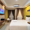 Отель Modern Studio Room Apartment At Tamansari Skylounge Makassar, фото 10