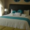 Отель Room in Guest Room - Ezulwini Guest House - Relaxing Queen Room With Balcony in Balito, South Afirca, фото 7