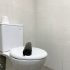 Отель Homey And Minimalist Studio Gateway Park Lrt City Bekasi Apartment, фото 11