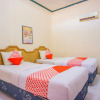 Отель Oyo 1636 Wisma Kuta Karang, фото 4