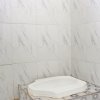 Отель OYO Life 92509 Maulana Guest House Simpur, фото 13