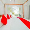 Отель OYO 416 Onaro Beach View, фото 11