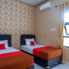 Отель RedDoorz Syariah near Stasiun Gumilir Cilacap, фото 8