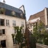Отель Place des Vosges - Bastille Apartment в Париже
