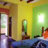 Отель Slightly Chilled Yellow House, фото 12