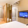Отель Comfy And Modern Look 1Br Gateway Park Lrt City Bekasi Apartment, фото 2