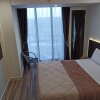 Отель SleepRest - Pollux Habibie A0818 на Острове Батаме