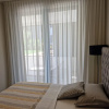 Отель Luxury Modern apt w Garden, 3 min Walk to Beach, фото 3