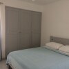 Отель La Peninsule - Town Apartment in Curepipe 3 в Кюрпипе