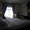 Отель Adig Suites в Энугу