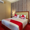 Отель Super OYO Capital O 293 Mutiara Hijau Suites Syariah, фото 16
