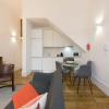 Отель LovelyStay - Cozy Duplex with Patio right off train&metro station, фото 11