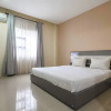 Отель OYO 91266 Markoni 18 Guest House, фото 3