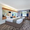 Отель Microtel Inn & Suites by Wyndham Lillington / Campbell Univ, фото 3