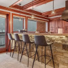 Отель Exclusive 4 Bedroom Ski in, Ski out Vacation Rental With Hot Tubs and Heated Outdoor Pool in Lionshe, фото 12