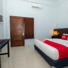 Отель Hening Homestay by OYO Rooms, фото 16