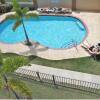 Отель Coqui penthouse 2 across Rincon beach, pool, bbq, power and water bup, фото 16