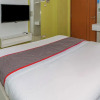 Отель Super OYO Capital O 93910 Asia Rooms @ Green Lake View Ciputat, фото 25