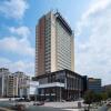 Отель Vienna International Hotel (Guangzhou Development District) в Гуанчжоу