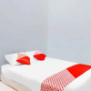 Отель SPOT ON 92072 Restu Ibu Homestay Syariah, фото 10