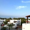 Отель Cabo Negro, La Cassia 2 bedrooms appartment , shared pool , 150 m away from the Beach, and Golf cour, фото 1