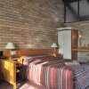 Отель All Travellers Motor Inn, фото 6