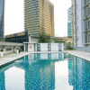 Отель Relaxing 2BR at The Empyreal Condominium Epicentrum Apartment By Travelio, фото 14