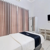 Отель Capital O 92250 Hall & Guesthouse Kowapi Syariah, фото 6
