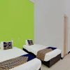Отель SPOT ON 92536 Teguh Homestay Syariah, фото 11