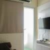 Отель Cozy Stay and Simply 2BR at Green Pramuka City Apartment, фото 6