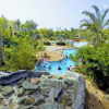 Отель Beachside Adventure Suites, фото 1