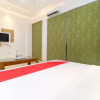 Отель OYO 26606 Hotel R K Grand, фото 13