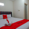 Отель RedDoorz Syariah near GOR Satria 4, фото 5