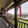 Отель Taohuatan River View Pool Yulongtanpan Inn, фото 2