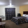 Отель Passport Inn and Suites, фото 12