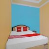 Отель OYO 92631 Hotel Dan Aula Wahyu Sari B, фото 12