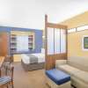 Отель Microtel Inn & Suites by Wyndham Chili/Rochester Airport, фото 1