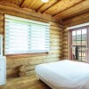 Отель Seogwipo Neul Ocean Log House Pension, фото 4