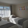 Отель Rose Apartments Unit 5 Central Rotorua- Accommodation & Spa в Роторуа