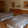 Отель Jacaranda Lodge, фото 4